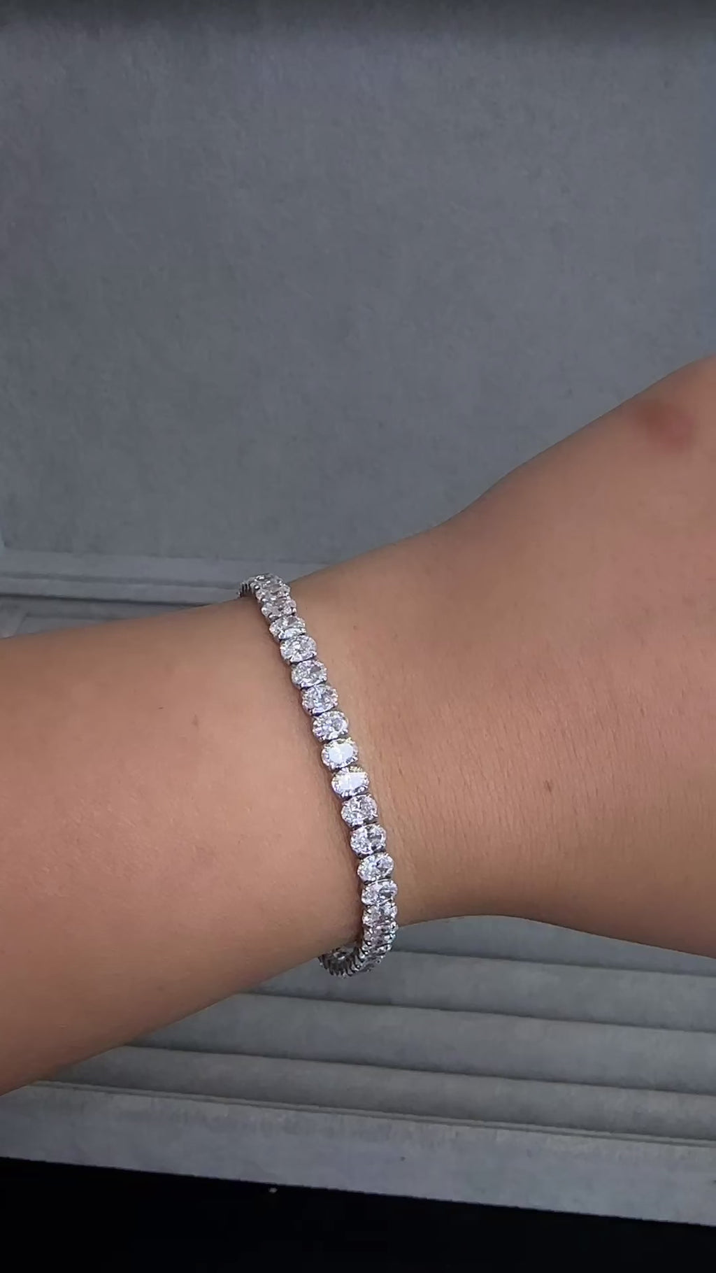 10ct oval cut diamond tennis bracelet in white gold featuring approximately 10 carats of oval diamonds with a 4.80mm width, available in lab grown or natural diamonds.