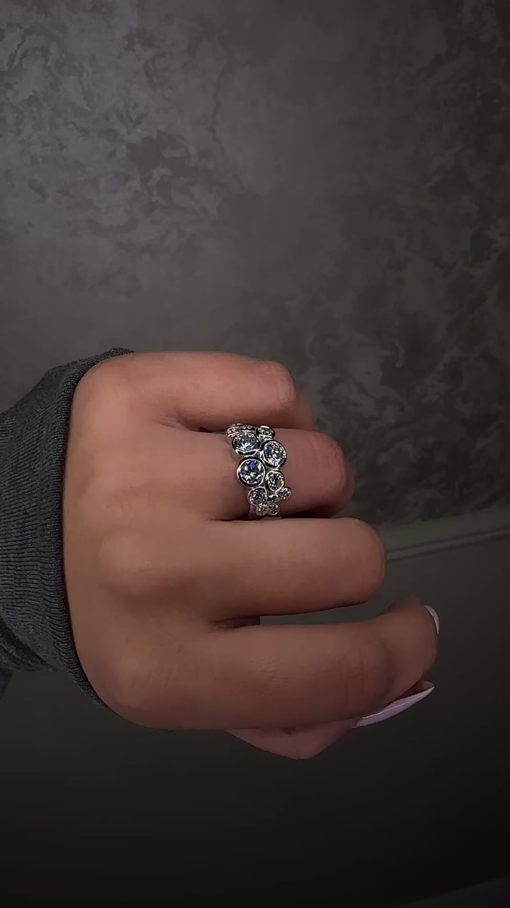 Bubble diamond ring with bezel set round diamonds, front view showing clustered bubble design. 9kt or 18kt yellow or white gold on hand