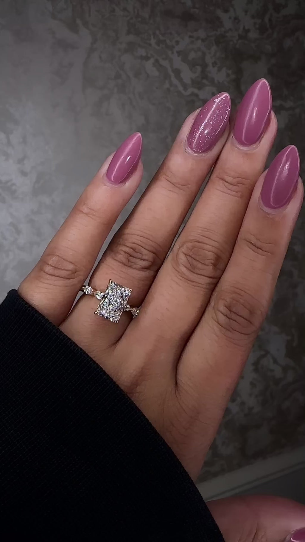 3ct Radiant cut lab grown diamond set with marquise side diamonds on the band, engagement ring, 18kt yellow gold on hand