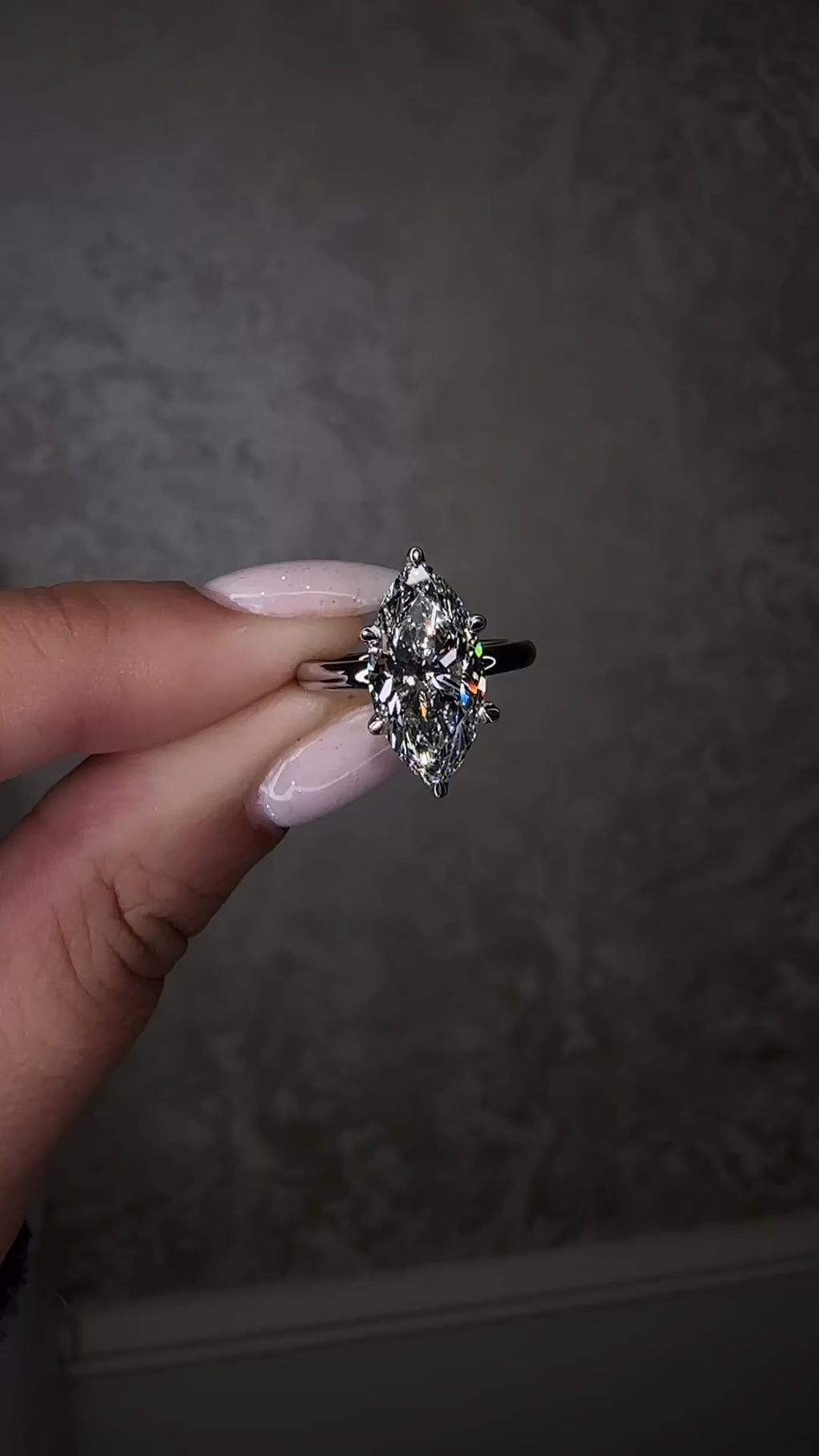3.50ct marquise cut lab grown diamond engagement ring with hidden halo and floating head in plain band, handcrafted in London by Layla Diamonds, in platinum