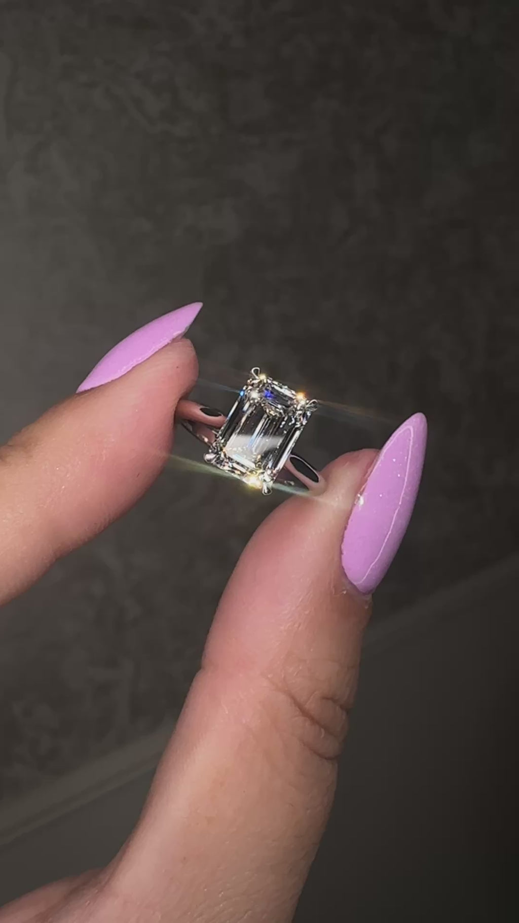 2.50ct emerald cut lab grown diamond cathedral engagement ring with diamond hidden halo, diamond bridge and polished band, handmade in London.