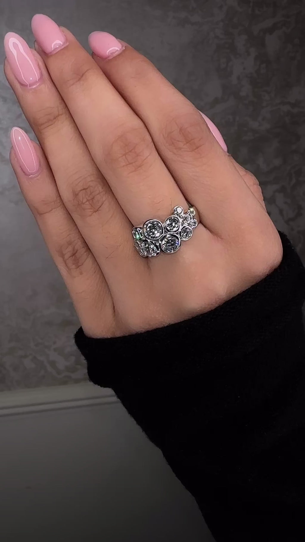 Bubble diamond ring with bezel set round diamonds, front view showing clustered bubble design. 9kt or 18kt yellow or white gold on hand