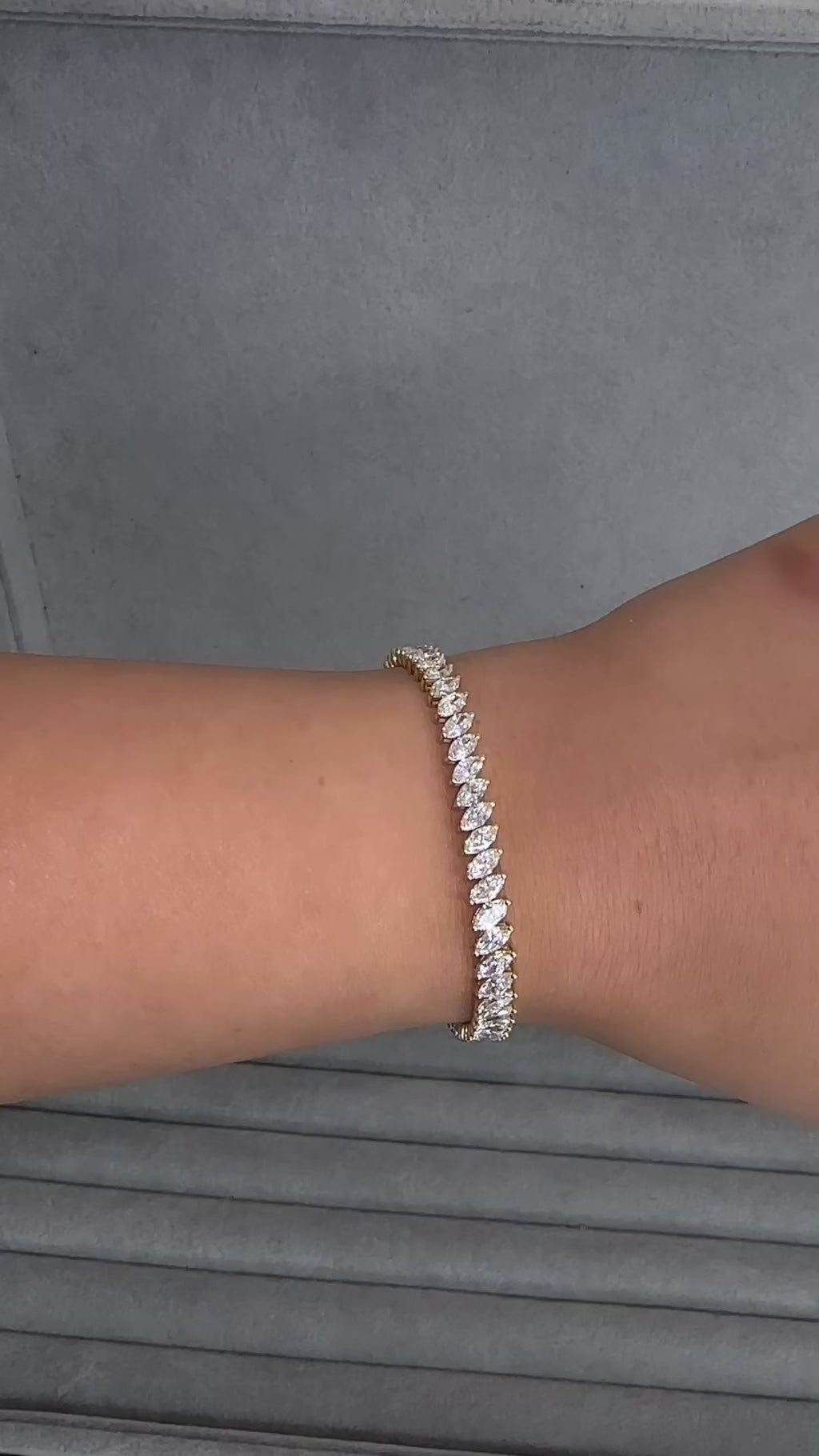 8ct+ slanted marquise cut diamond tennis bracelet in yellow gold with lab grown or natural diamonds.