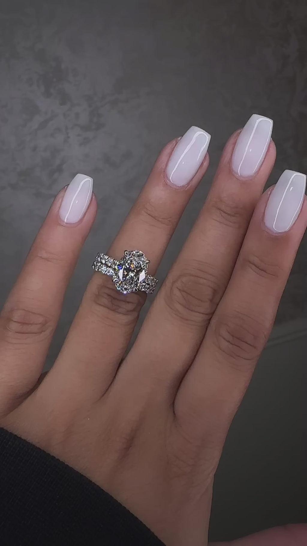 3.50ct oval cut lab grown diamond engagement ring u prong setting on hand