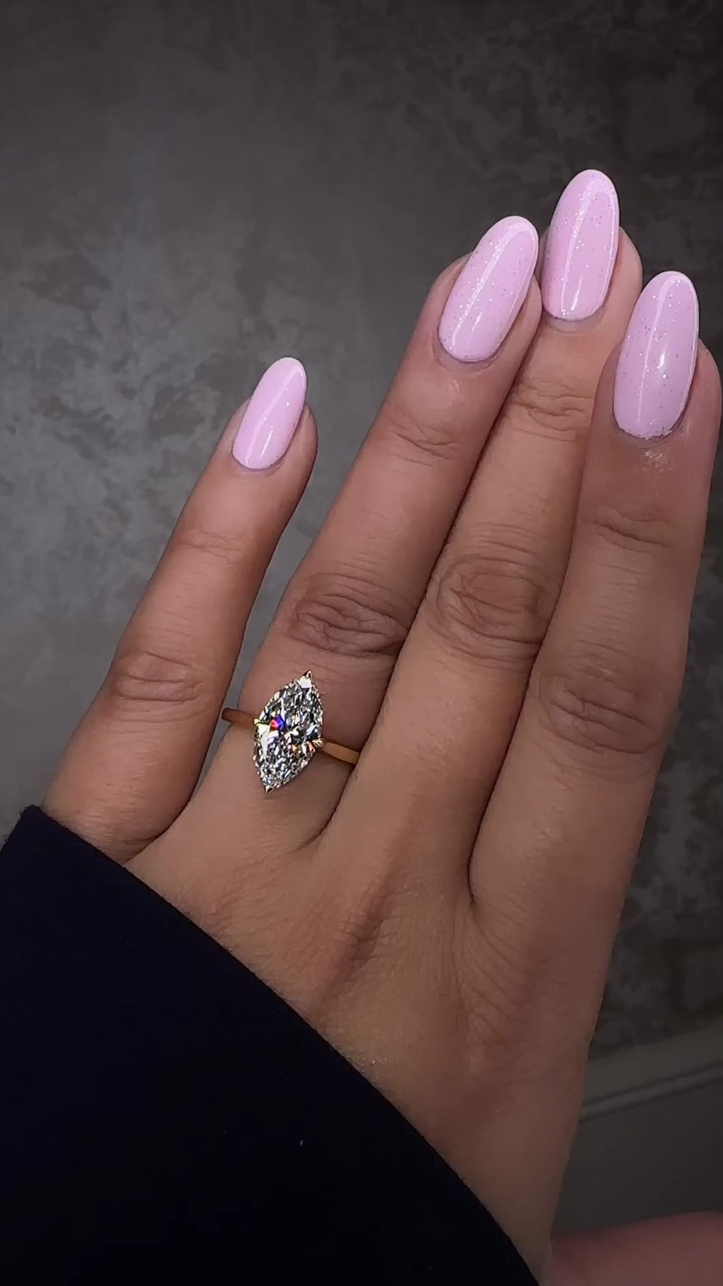 3ct Marquise Cut lab grown Diamond set in a Tapered plain Band Solitaire with a diamond Hidden Halo engagement ring on hand