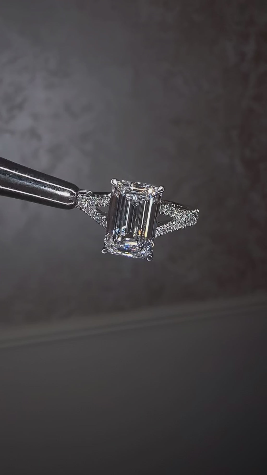 3ct emerald cut lab grown diamond engagement ring with a diamond split shank band, handcrafted in London and available in Platinum, 18ct yellow, white or rose gold.