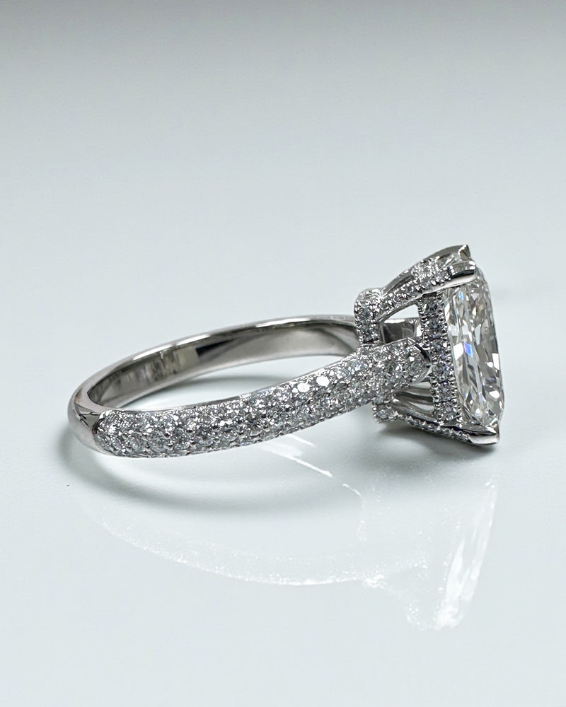3ct radiant cut lab grown diamond set in a three row diamond band 3D cathedral style with hidden halo, platinum or 18kt yellow gold