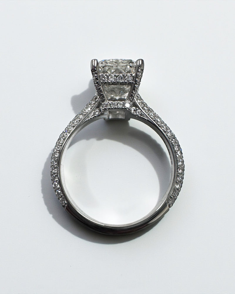 3ct radiant cut lab grown diamond set in a three row diamond band 3D cathedral style with hidden halo, platinum or 18kt yellow gold