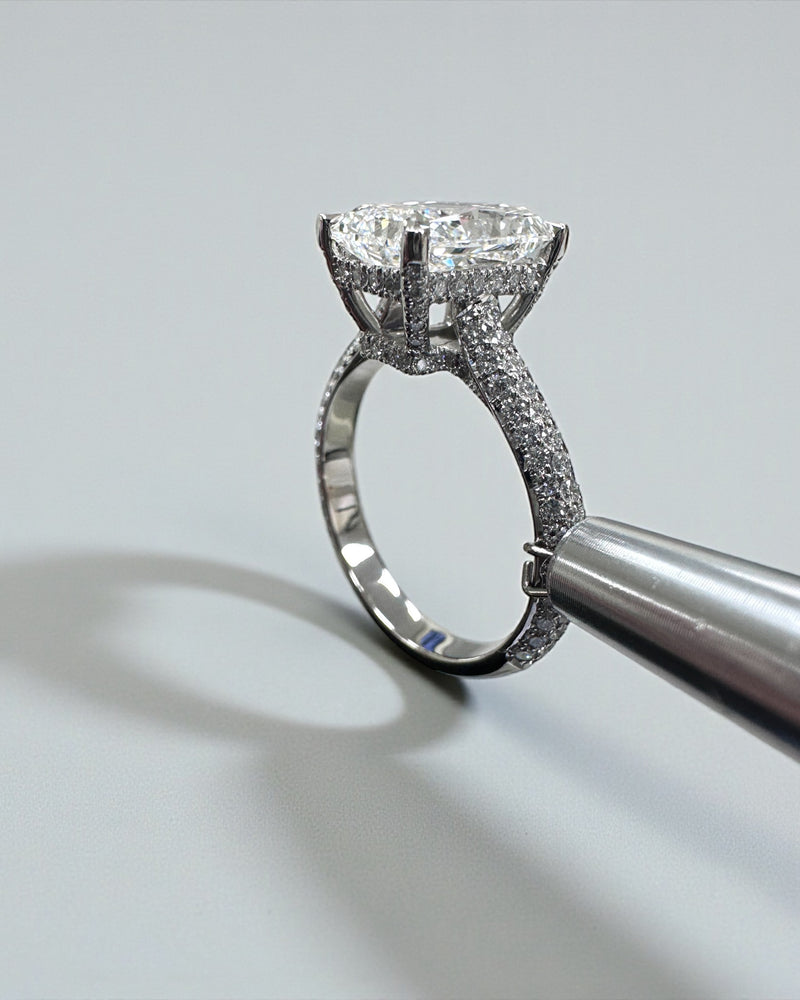3ct radiant cut lab grown diamond set in a three row diamond band 3D cathedral style with hidden halo, platinum or 18kt yellow gold