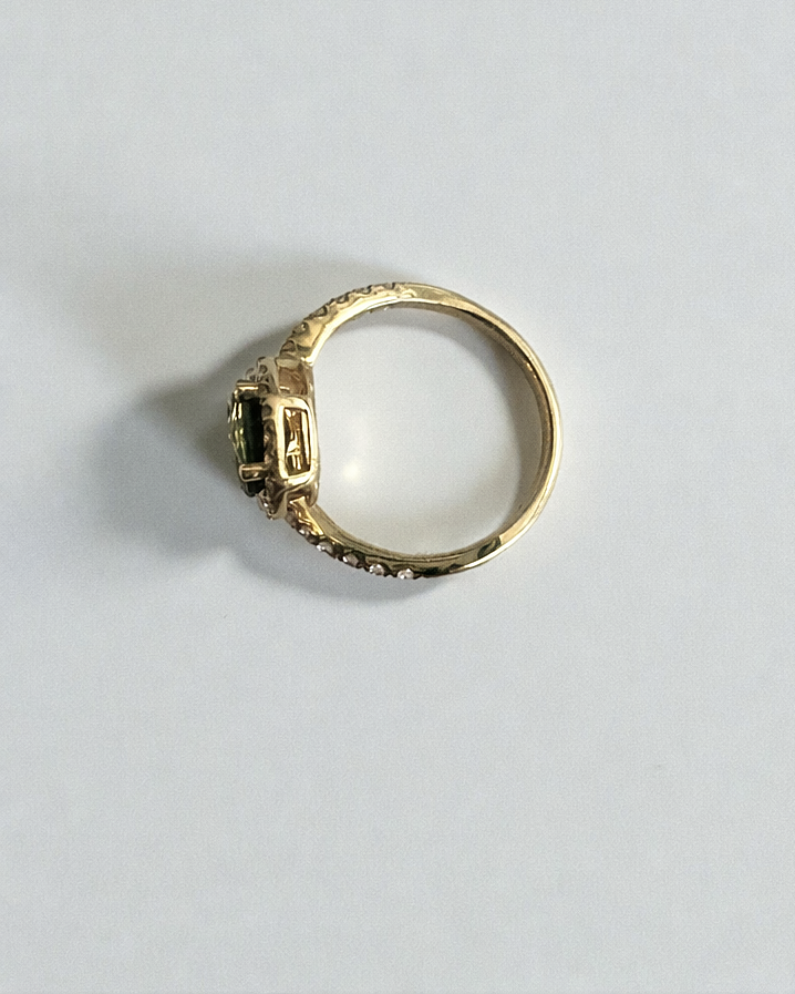 Natural teal sapphire two stone diamond halo ring in 18kt yellow gold
