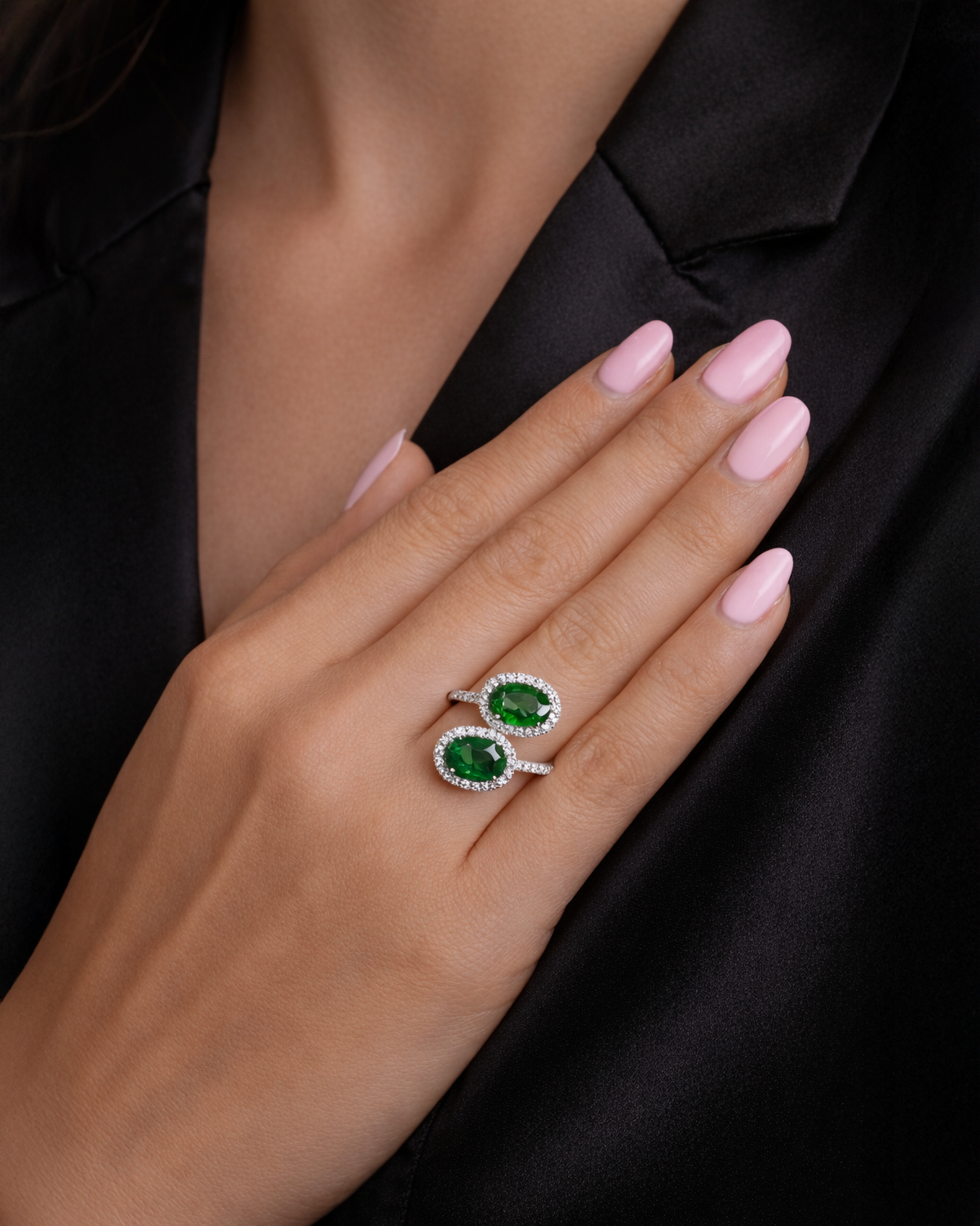 Two stone oval green tourmaline and diamond halo ring in platinum