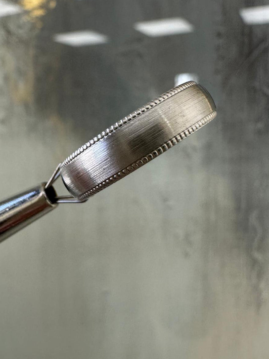 A classic 5mm court milgrain edge brushed ring from our wedding band for him collection.