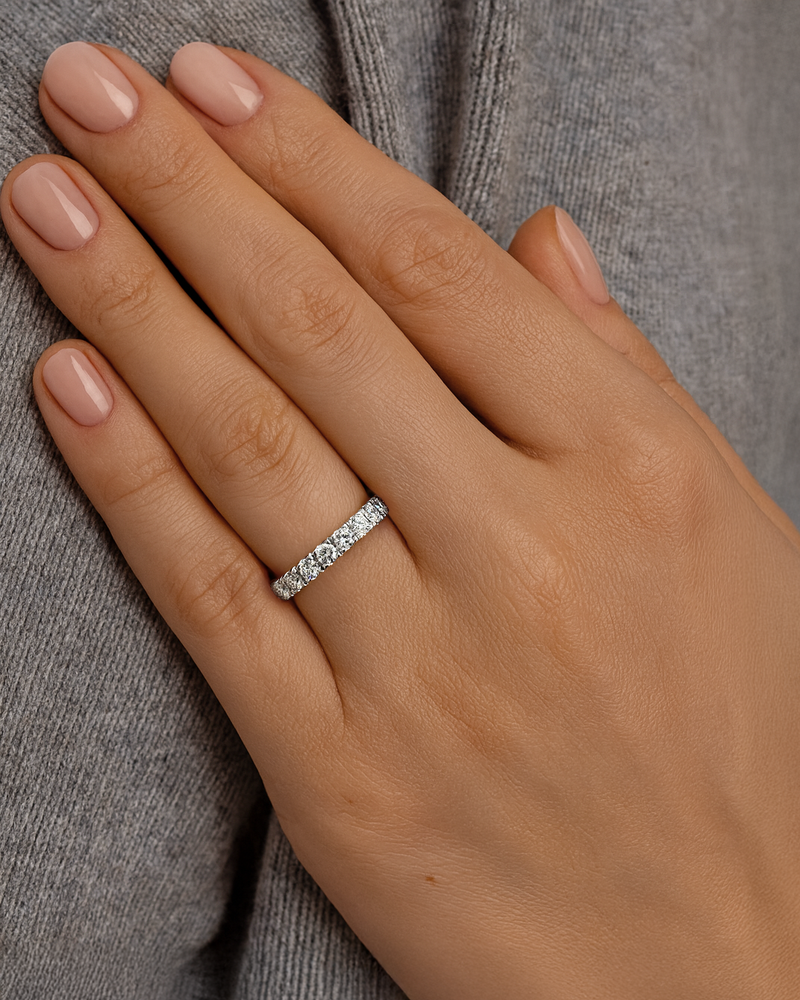 A classic 3mm half diamond eternity ring from our wedding band platinum or 18kt white gold for women collection, 