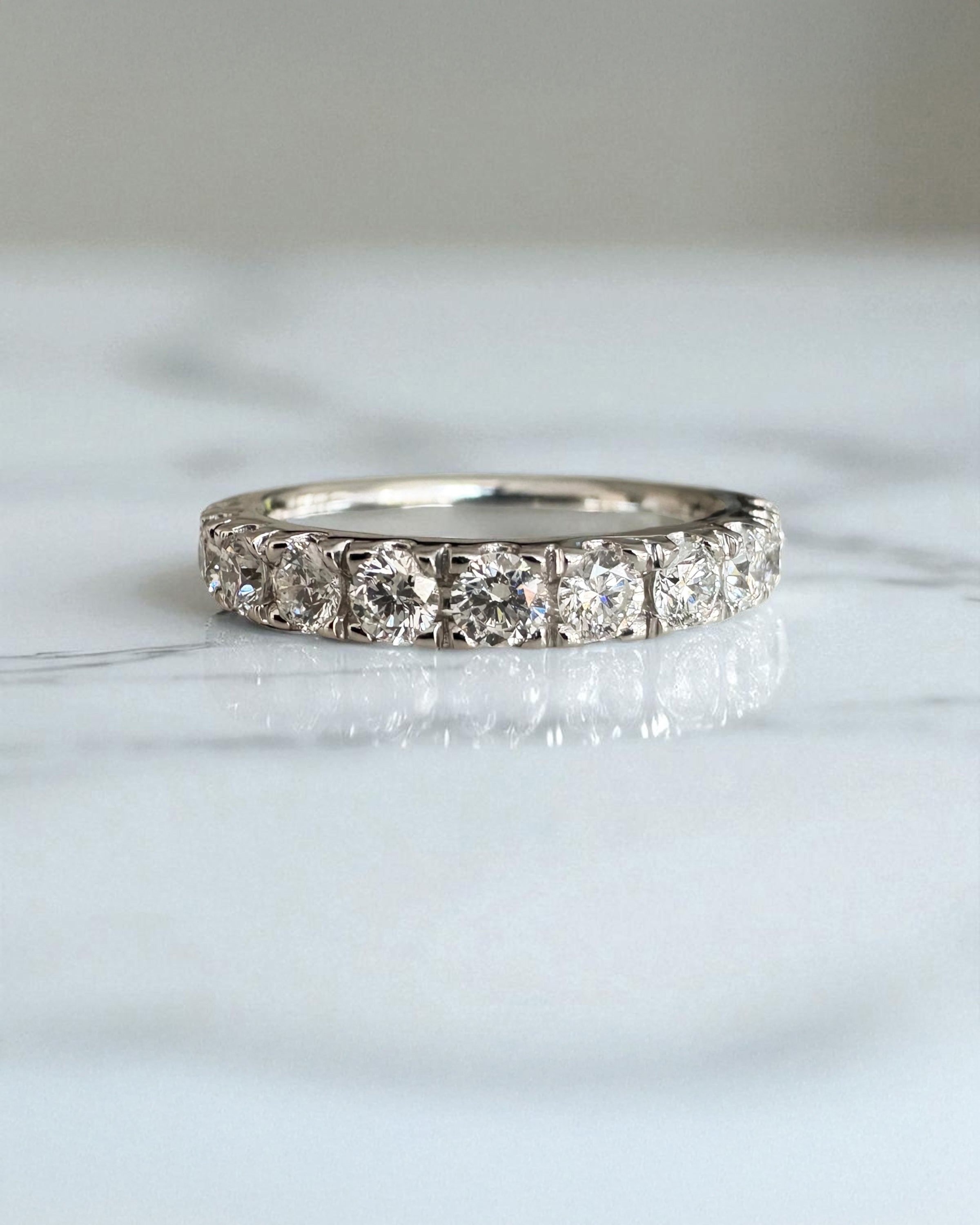 Side profile of the 3mm half eternity band, part of our wedding bands for women range.