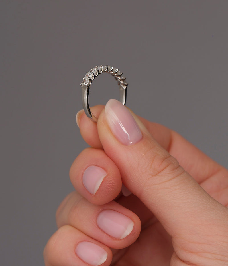 Side profile of a micro radiant diamond band, part of our women's wedding bands range.