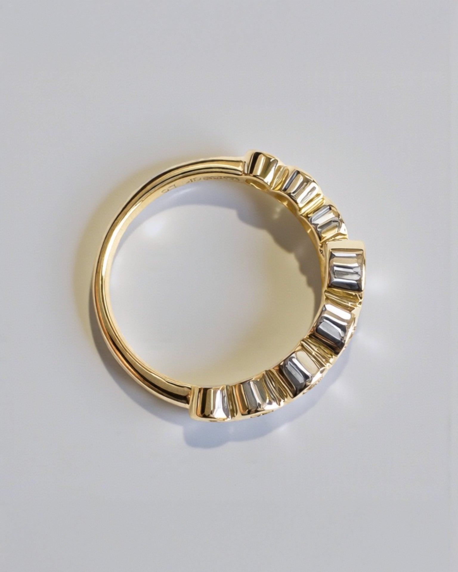 Open wrap diamond ring with bezel set stones, handcrafted fine jewellery