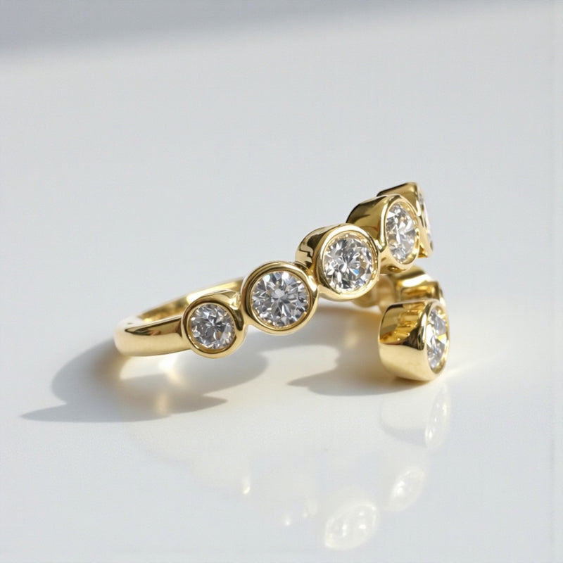 Bezel set diamond bubble wrap ring with round brilliant diamonds