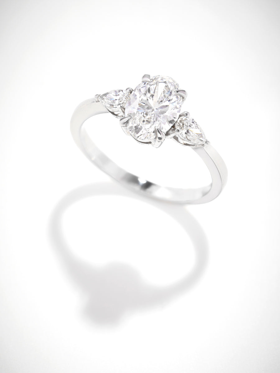 oval cut pear trilogy lab grown diamond engagement rings