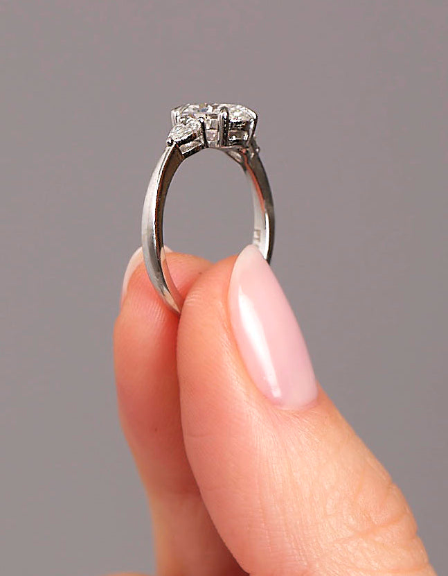 1.25ct oval cut lab grown diamond trilogy engagement ring with pear cut side diamonds by Layla Diamonds.
