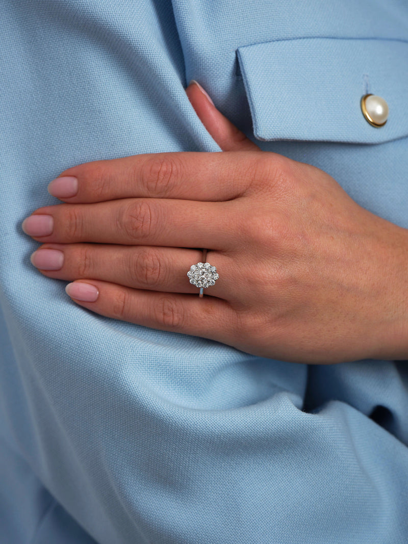 0.70ct Oval Flower Halo Lab Grown Diamond Engagement Rings in London.