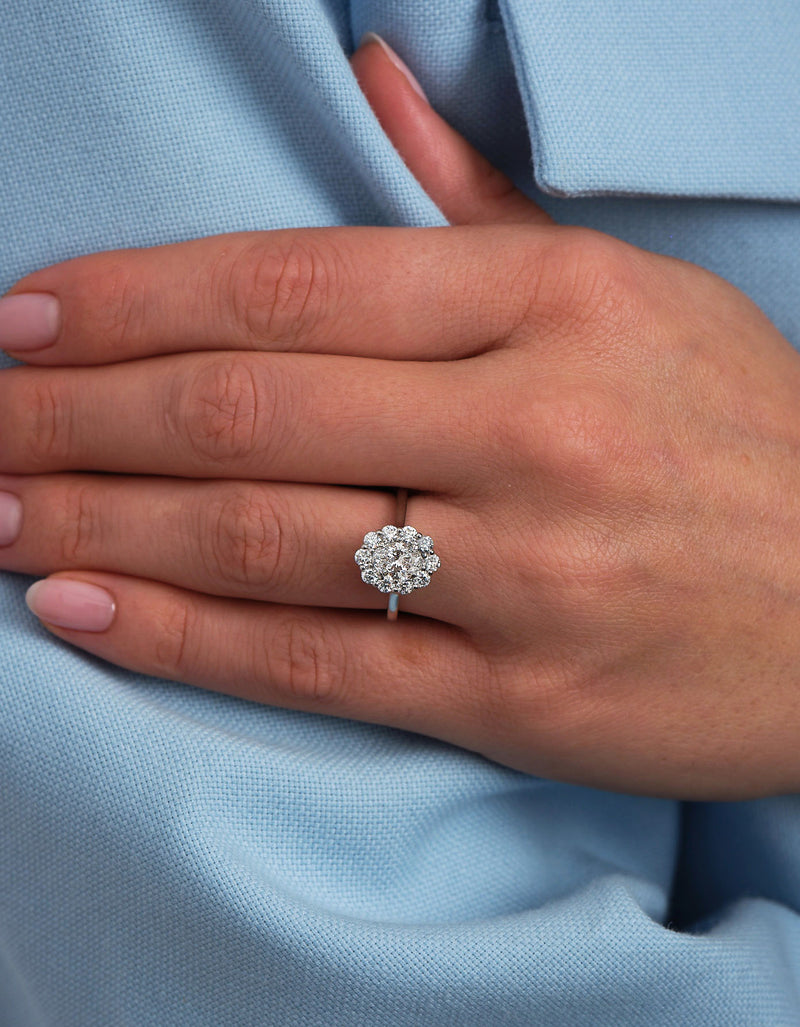 0.70ct Oval Flower Halo Lab Grown Diamond Engagement Rings in London.