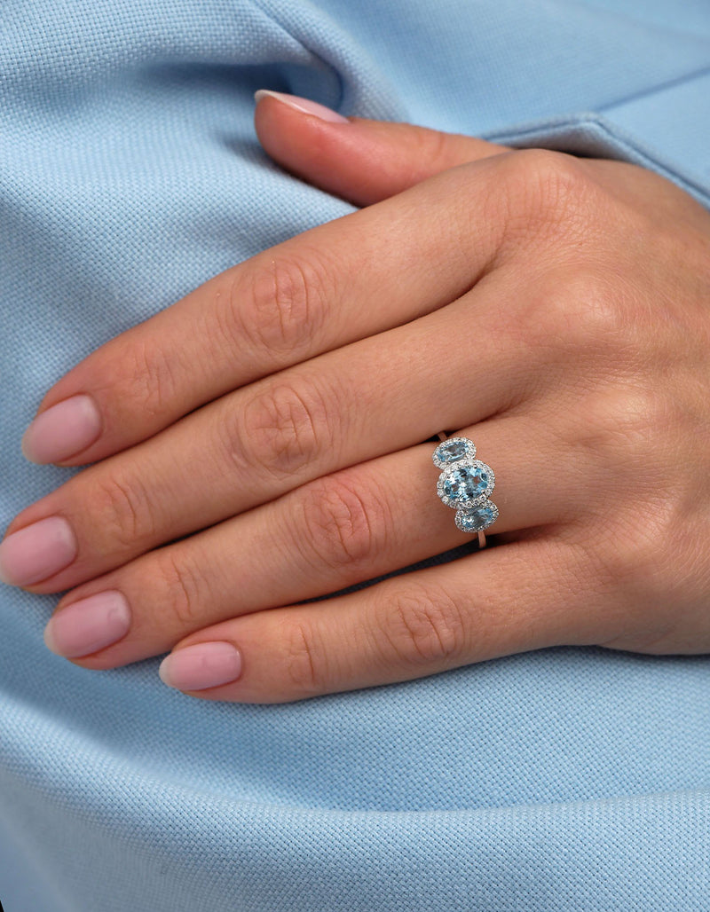 Oval Aquamarine Trilogy Lab Grown Diamond Engagement Rings.