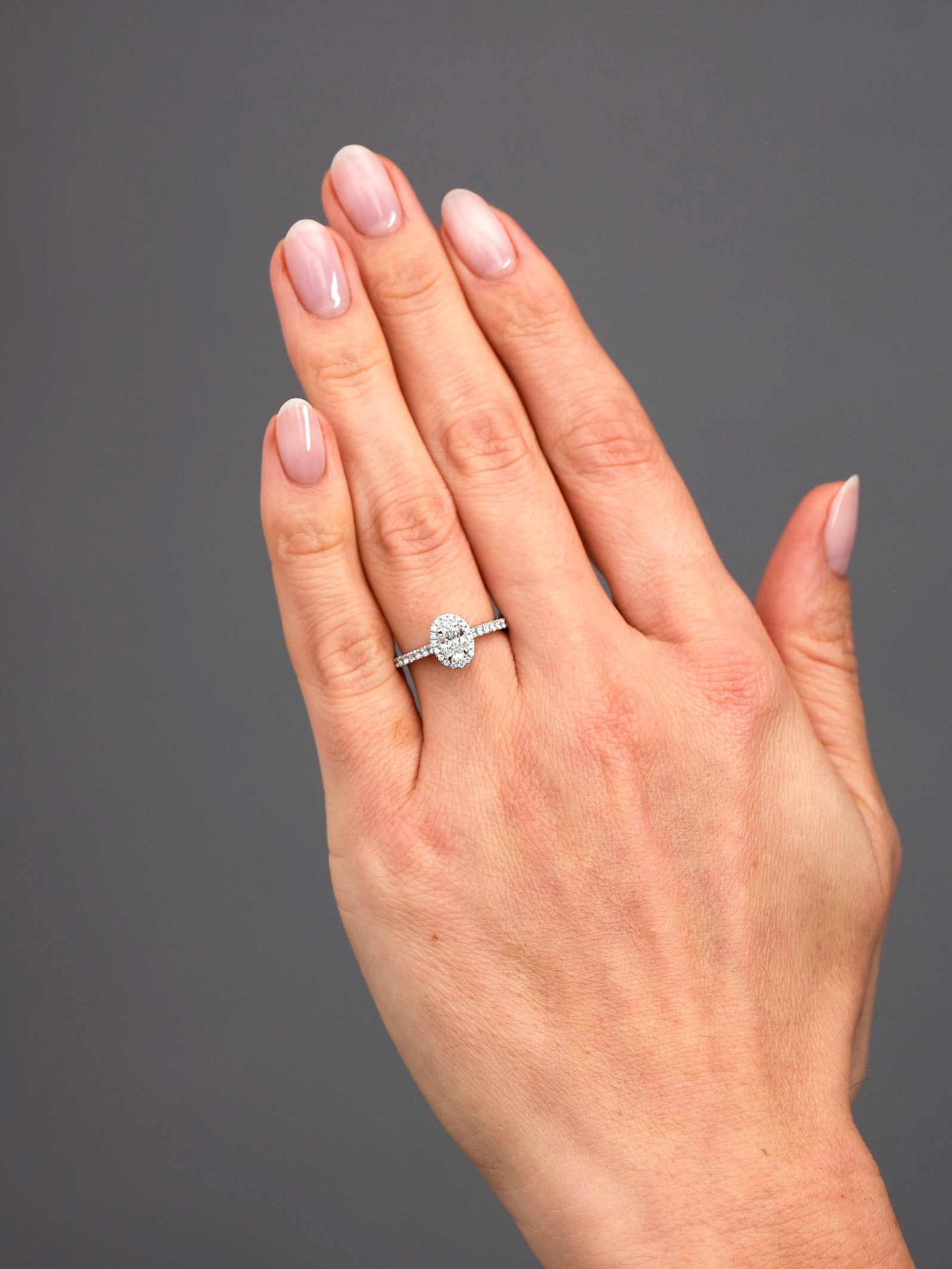0.50ct Oval Seamless Halo Lab Grown Diamond Engagement Rings in London