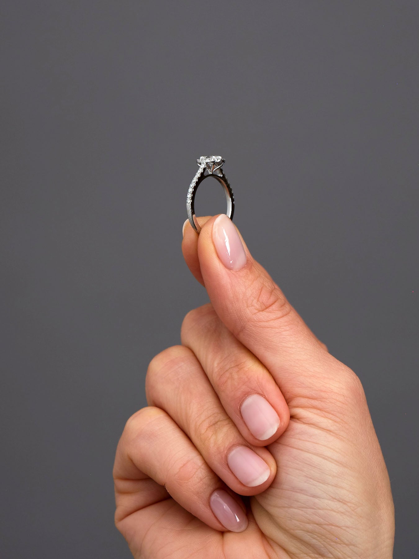 0.50ct Oval Seamless Halo Lab Grown Diamond Engagement Rings in London.