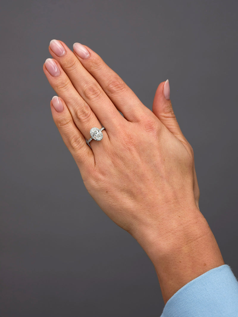 2ct Oval Seamless 2D Halo Lab Grown Diamond Engagement Rings in London.