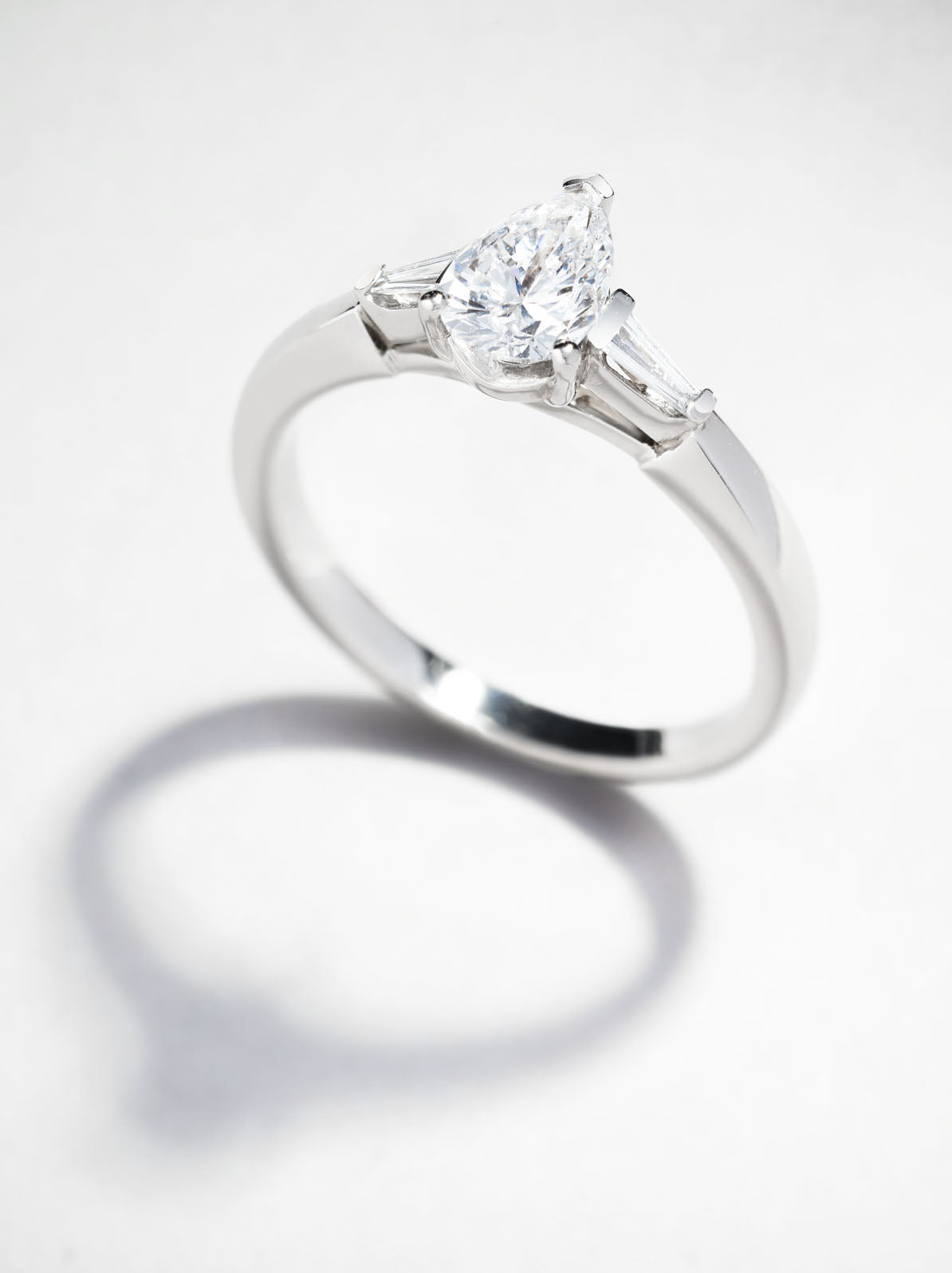 0.50ct Pear with tapered baguettes Lab Grown Diamond Engagement Rings.