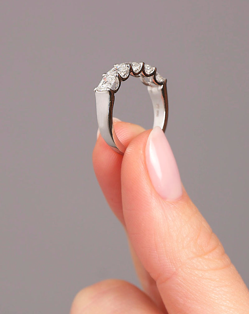Side profile of the 2ct Asscher cut diamond band, showcasing the step-cut profile of this Asscher cut diamond ring.