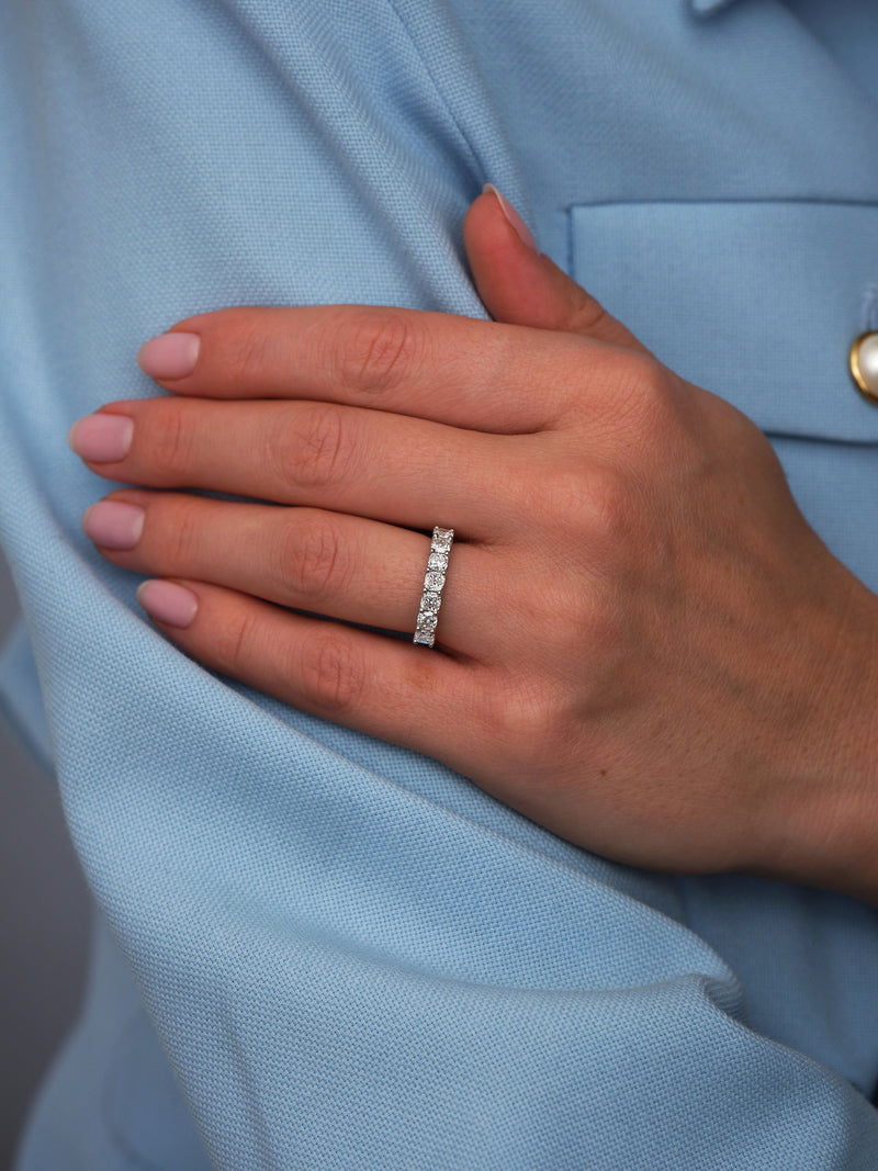 Perspective view of a high-quality cushion cut diamond ring, perfect for pairing with diamond engagement band bridal sets.