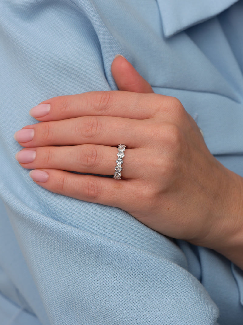 A unique geometric hexagon cut eternity ring from our premium diamond engagement band collection.