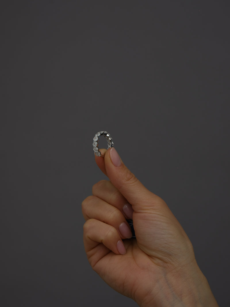 Perspective view of a high-quality hexagon diamond ring, perfect for matching with diamond engagement band bridal sets.