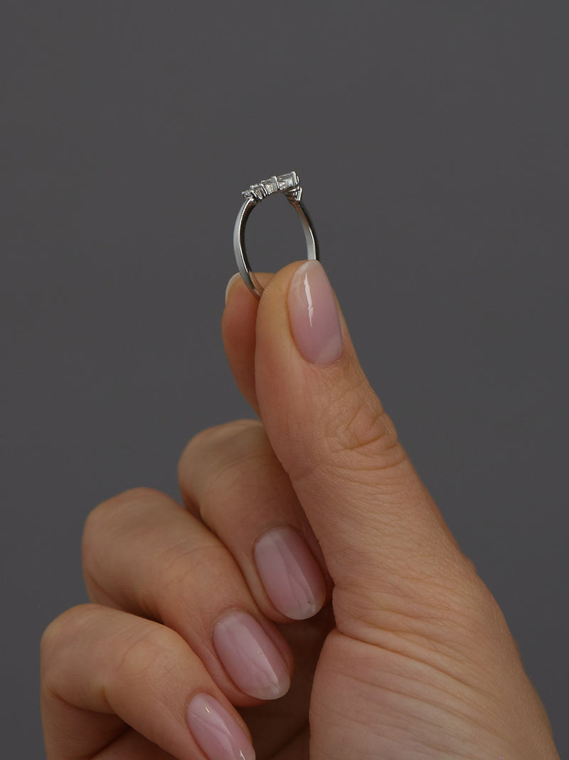 Perspective view of a high-quality fancy wishbone ring, perfect for stacking with a diamond engagement band bridal set.
