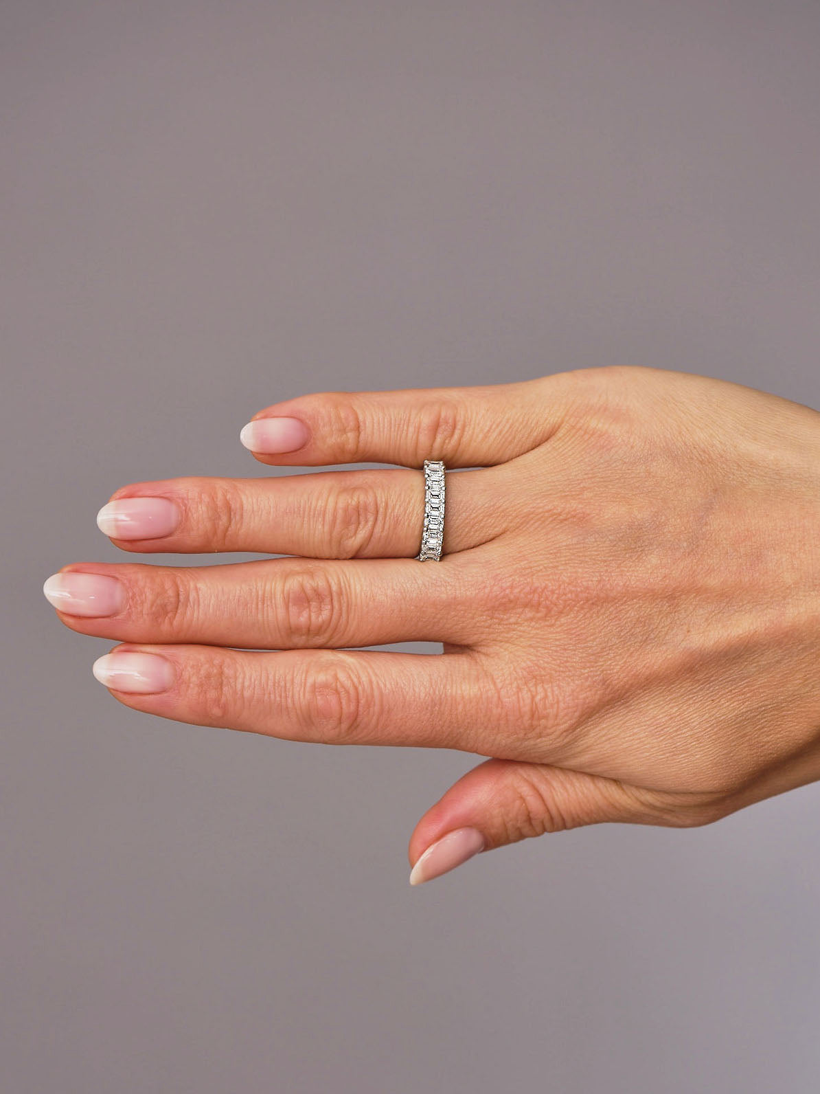 1.4ct emerald cut diamond band from our diamond engagement rings collection.