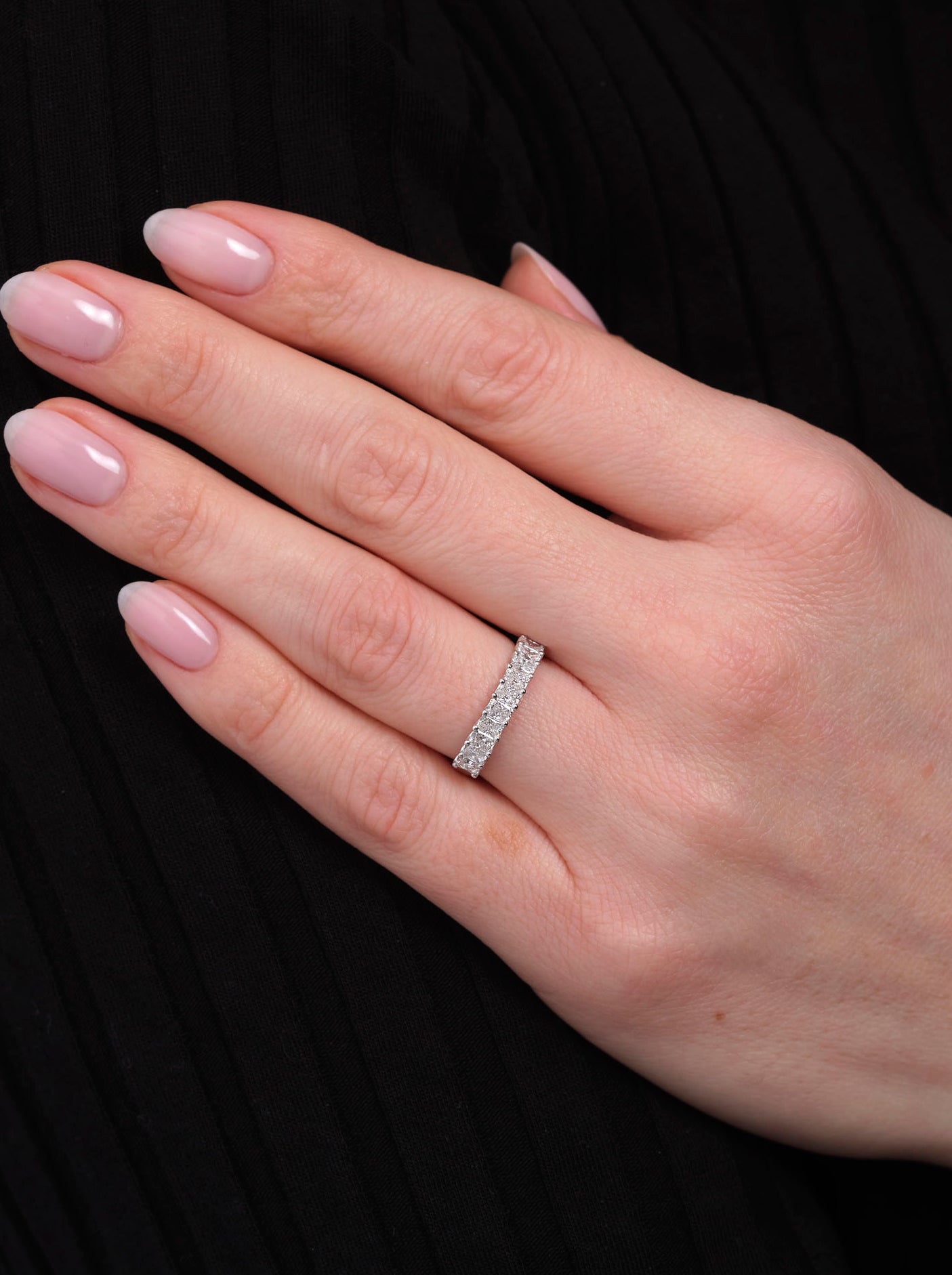 A comfort fit mini radiant diamond band from our diamond rings for women collection.