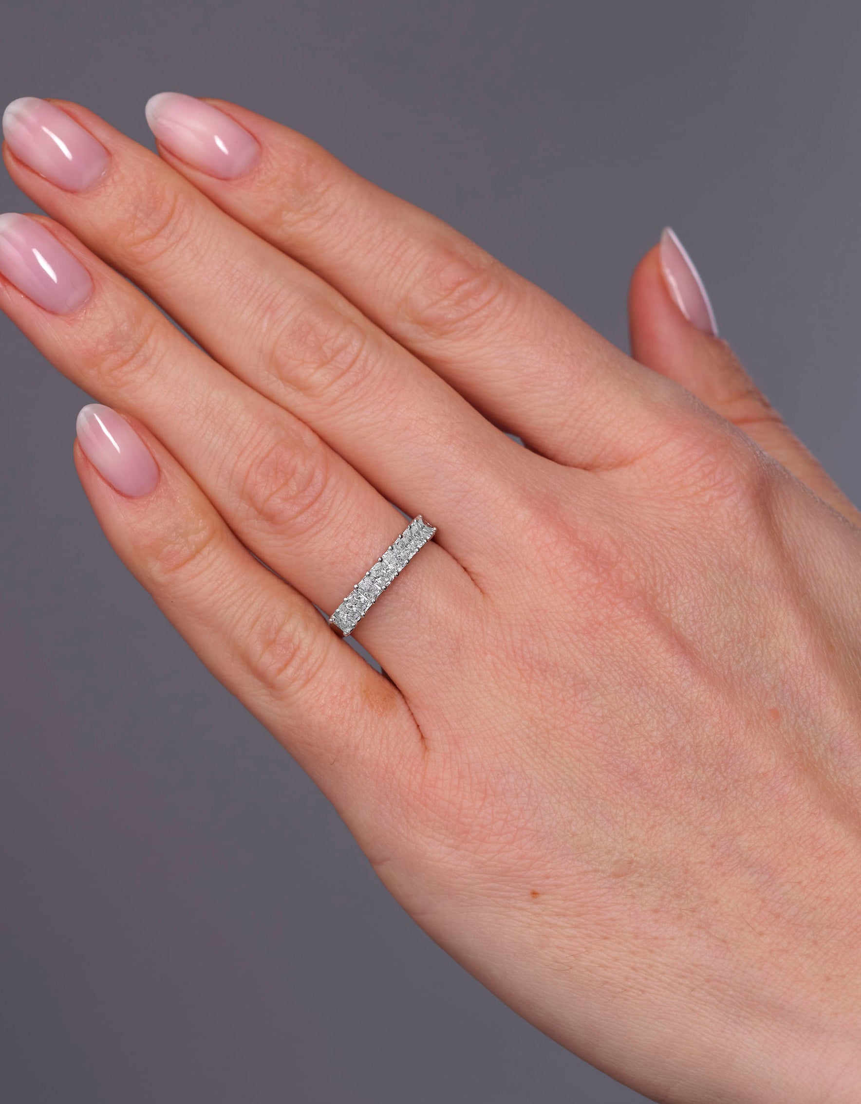 Side profile of a mini radiant cut band, part of our diamond rings for women range.