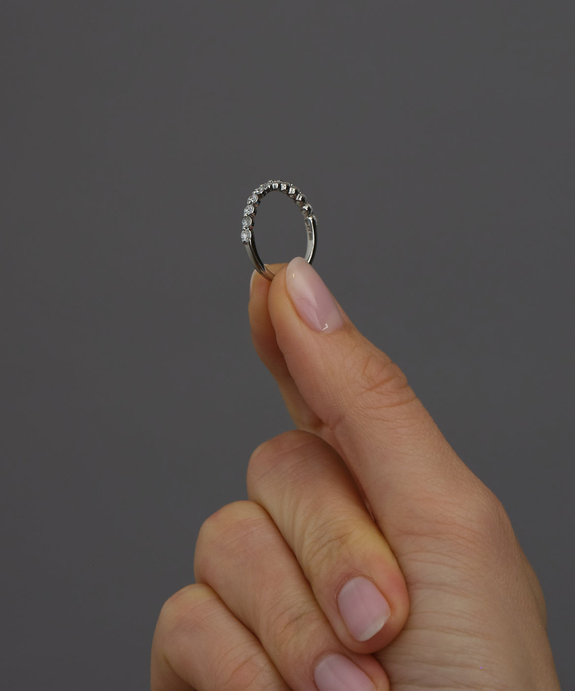 Perspective view of a bubble band, perfect for stacking with other diamond rings for women.