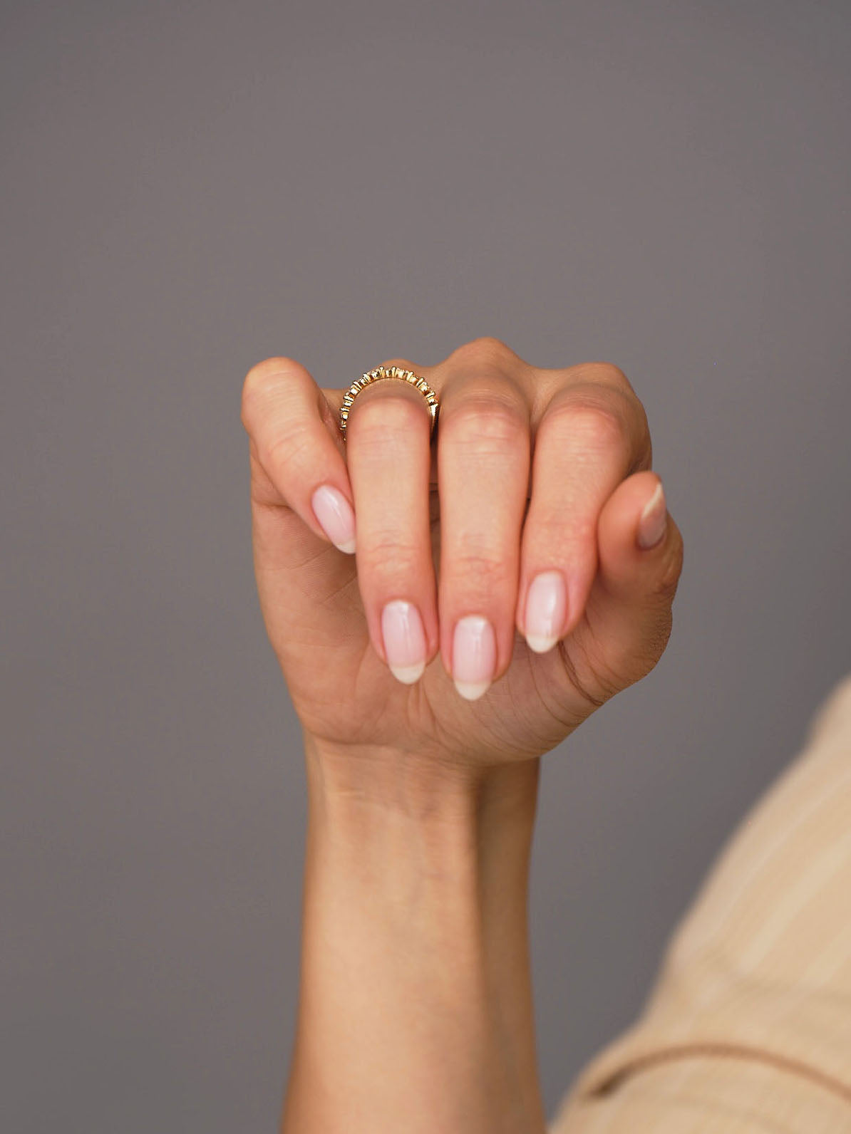 Perspective view of a marquise and round eternity ring, perfect for stacking diamond wedding bands.