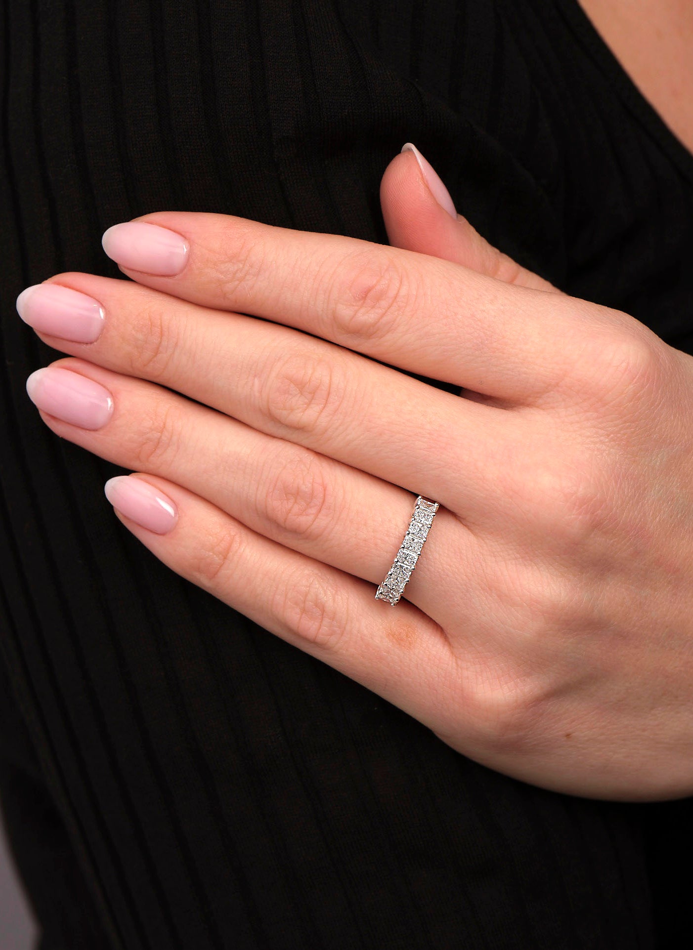 A comfort fit mini radiant diamond band from our engagement bands for women collection.