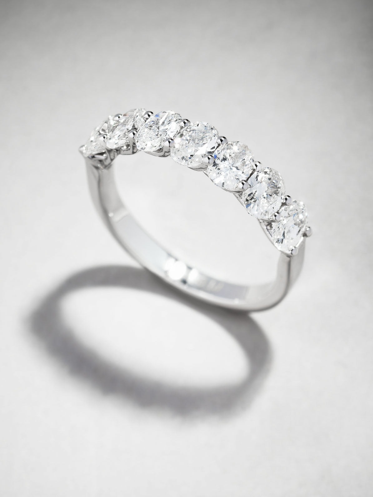 Side profile of the oval maxi diamond band, showcasing the elegant shared-prong setting in our engagement rings for women range.