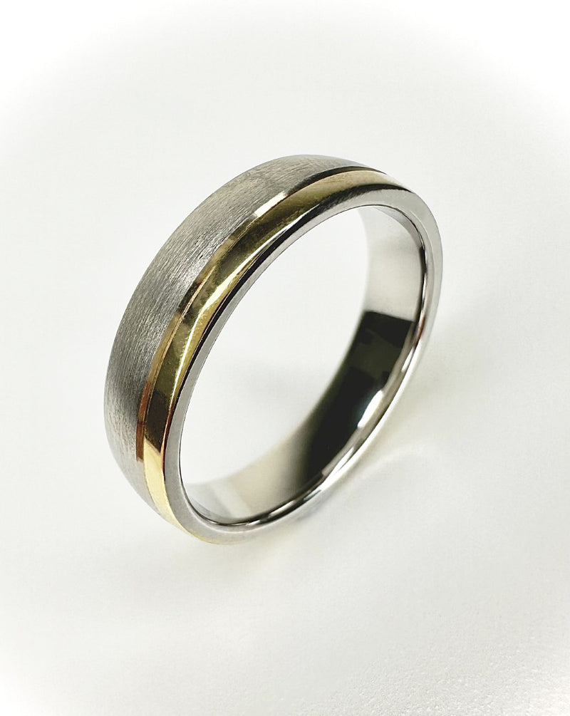 A contemporary 5mm court two-tone matt and polished ring from our premium male engagement bands collection.