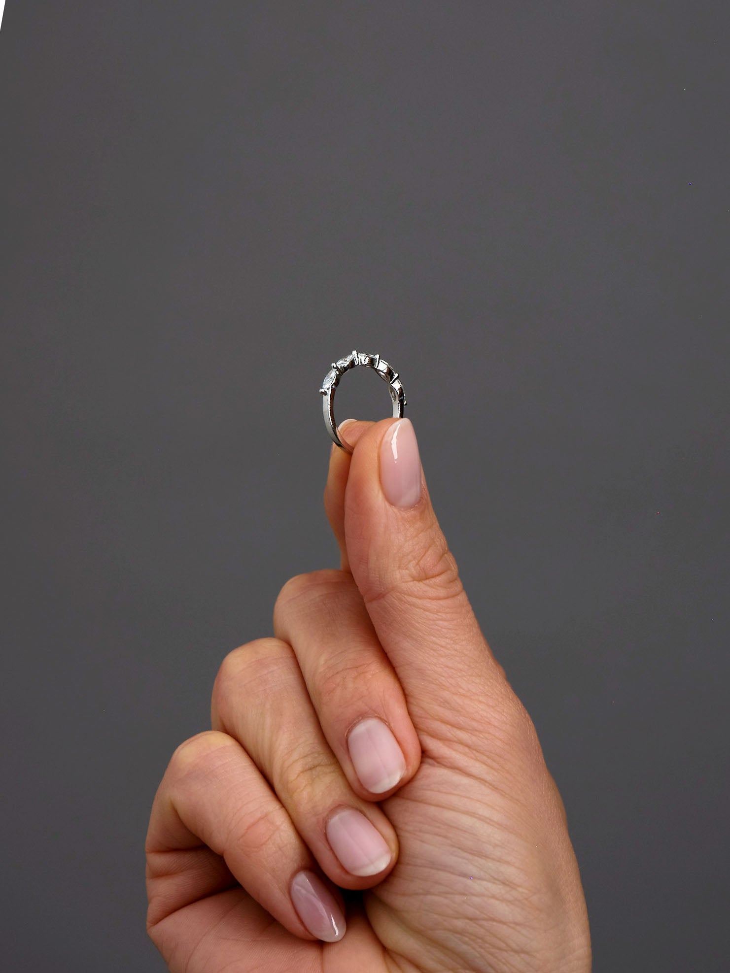 Close-up detail of the high-quality stones used in these marquise diamond engagement bands.