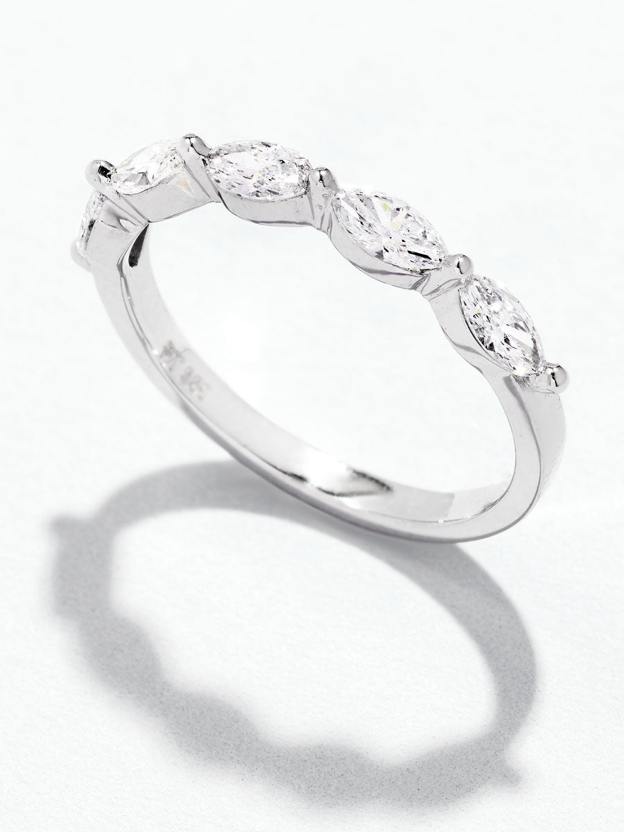 Side view of the marquise diamond engagement bands showing the unique stone alignment.
