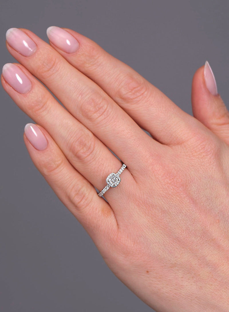 0.35ct cushion cut seamless halo ring from the marquise engagement ring diamond collection.