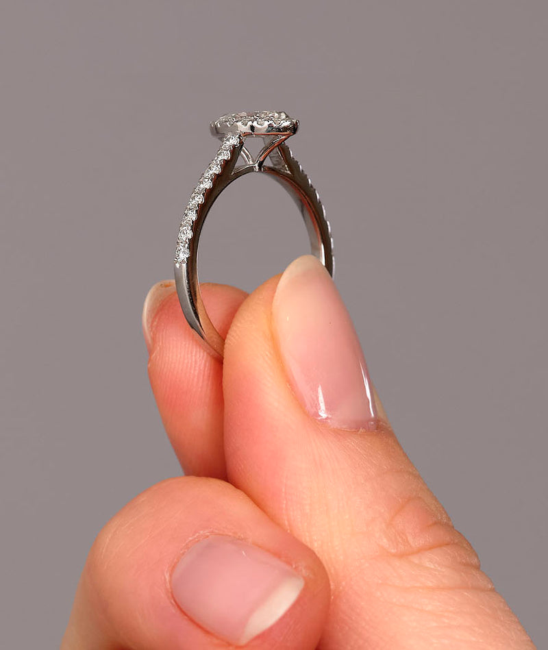 Side view of a cushion cut diamond ring, part of the marquise engagement ring diamond range.