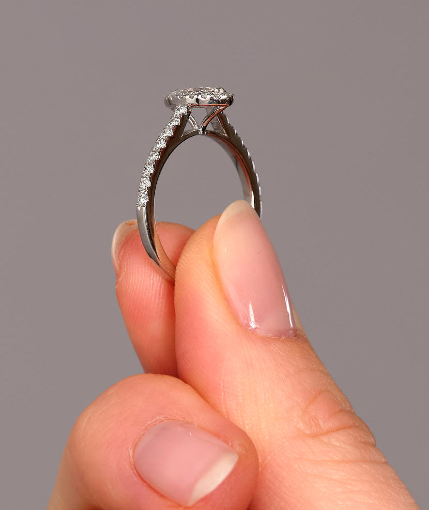 Side view of a cushion cut diamond ring, part of the marquise engagement ring diamond range.