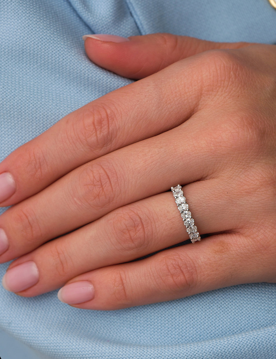 A comfort fit mini oval diamond band from our oval diamond engagement bands collection.