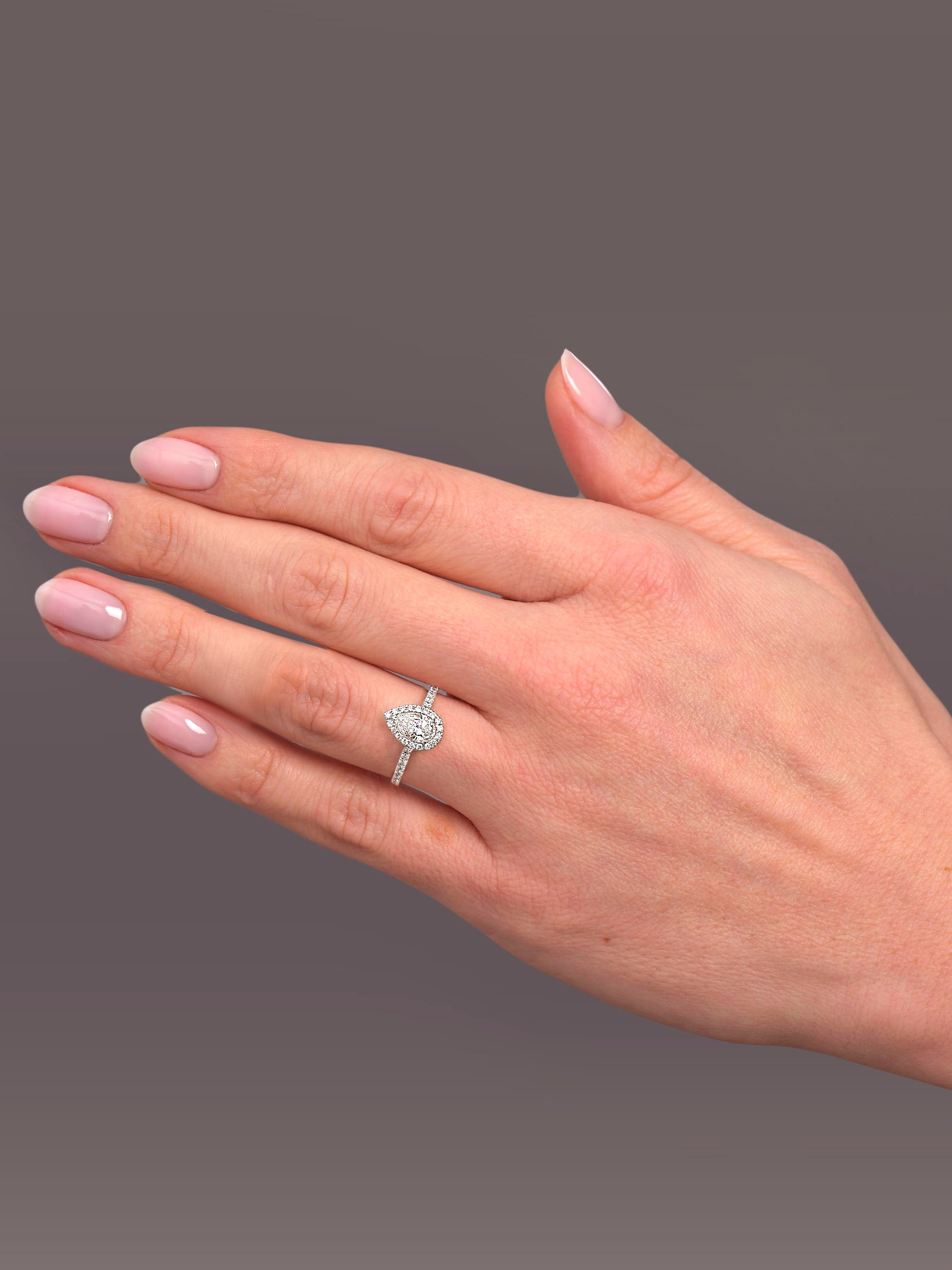 0.70ct Pear in Seamless Halo Lab Grown Diamond Engagement Rings.